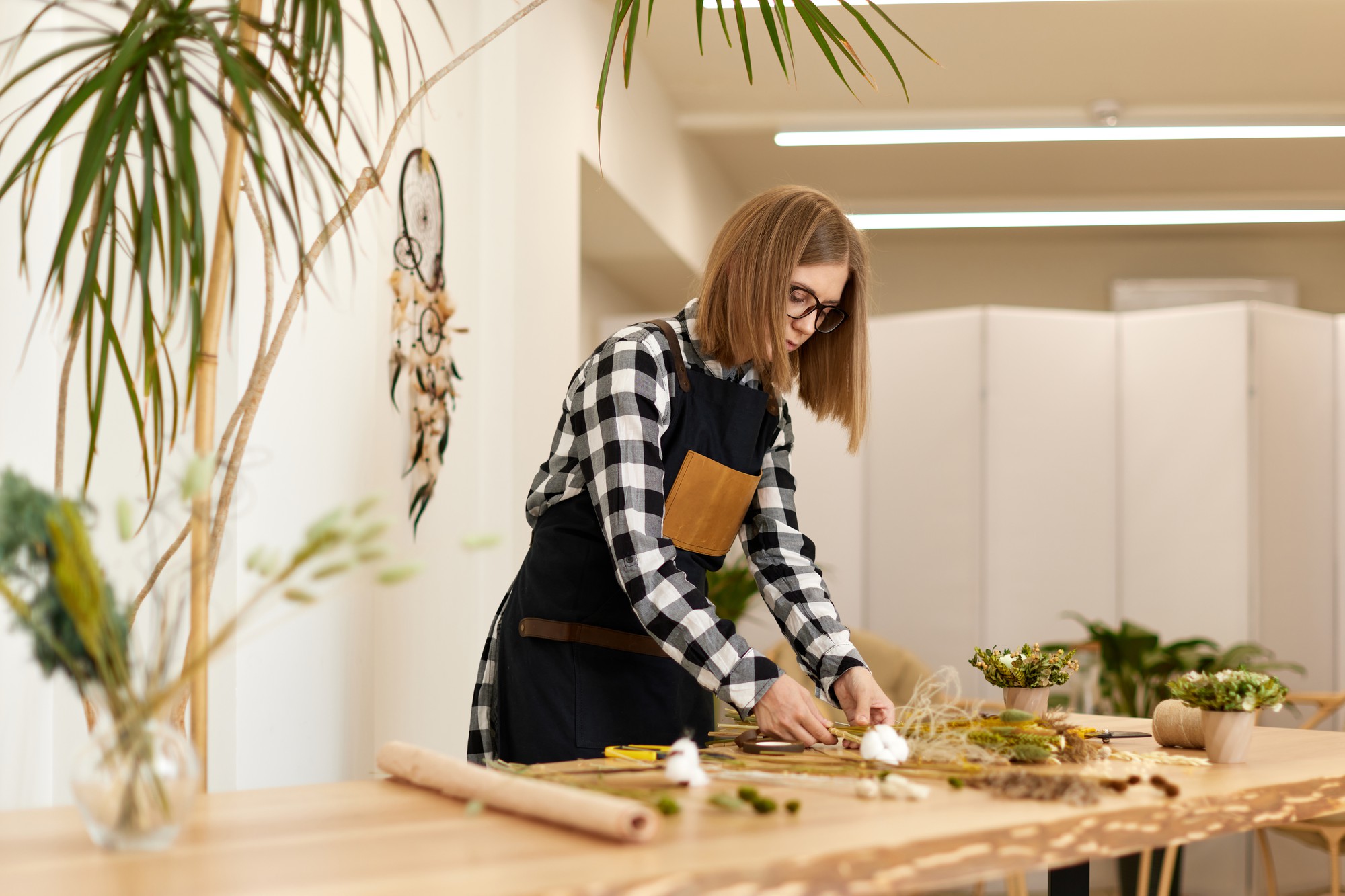 Workshop reception area with plants